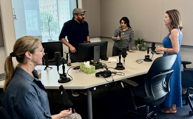 Elizabeth Sparks-Holmes, Joan VonDras and the Meet Me production team around the microphones in the St. Louis Public Radio studio